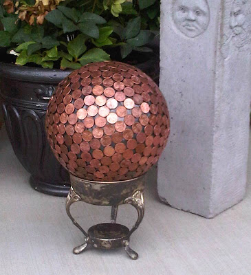 How to make a penny bowling ball, fun and unique yard art for your garden. And some people say the copper pennies repel slugs!
