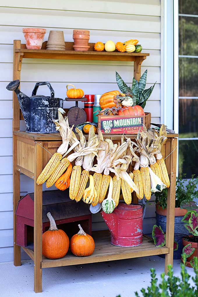 Learn how to make this harvest themed corn garland for fall decor. 