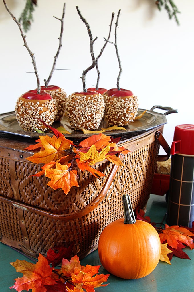 candied apples and a vintage picnic basket