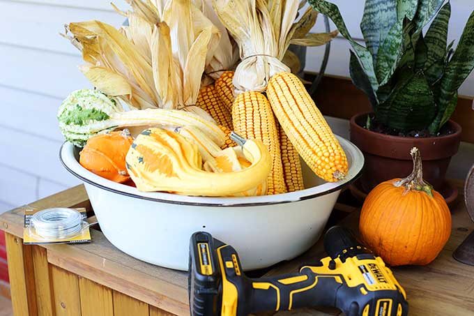 Supplies needed to make corn garland for fall decor.