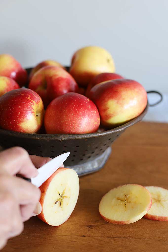 Slicing apples and oranges for homemade stovetop potpourri
