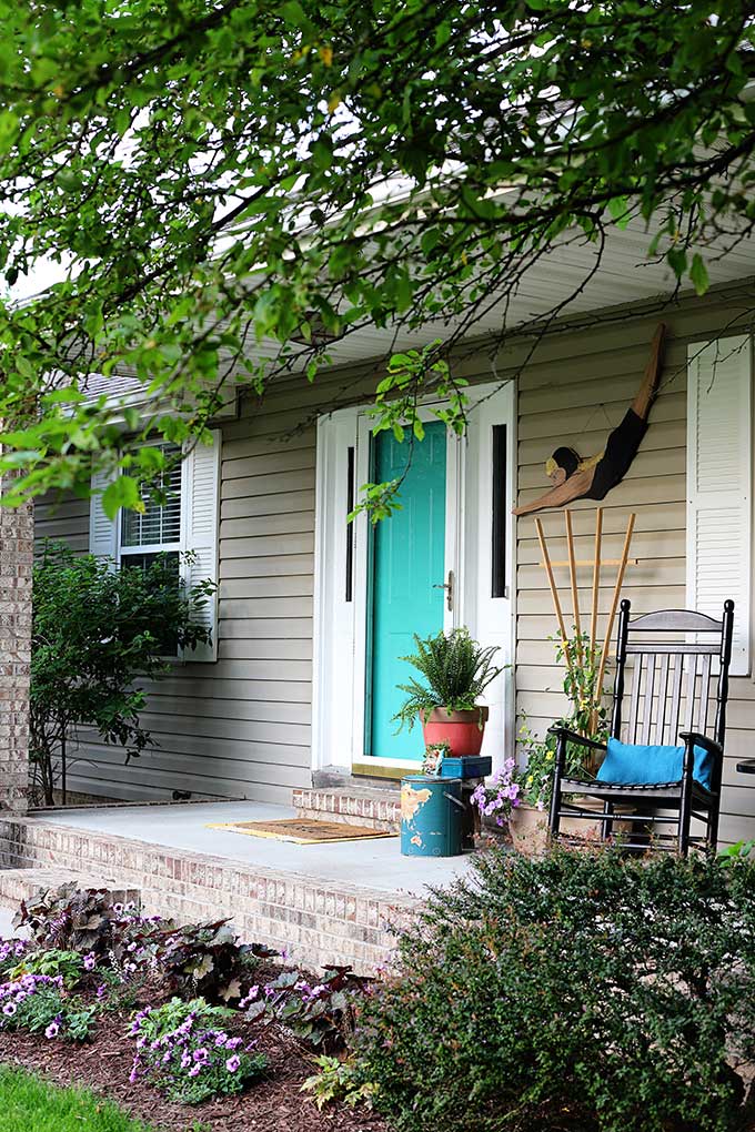 Vintage eclectic style decor for a summer front porch