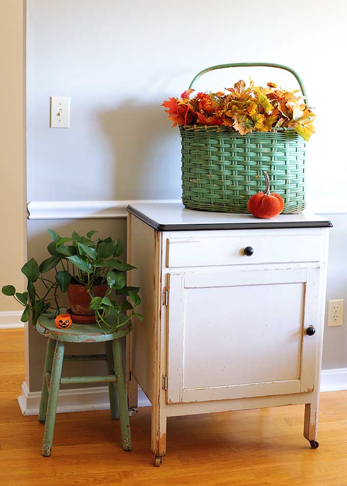 Vintage kitchen cabinet with fall decor