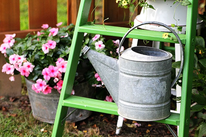 Vintage-Galvanized-Watering-Can-4396Repurpose a vintage tin dollhouse into a birdhouse using this in-depth tutorial. A playful and fun idea for your garden.