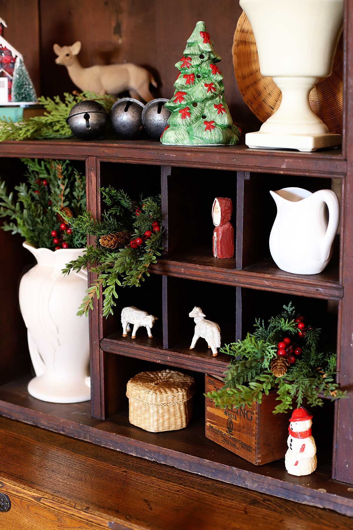 decorating the hutch for Christmas