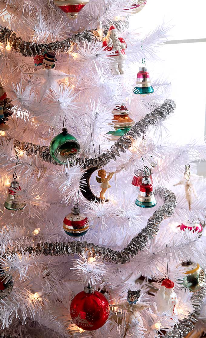 Vintage Shiny Brite ornaments on a white Christmas tree