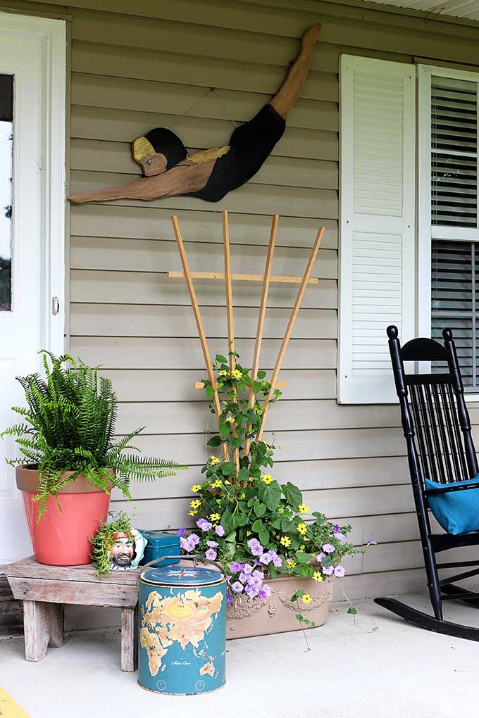 Boho style porch decor using items from the thrift store